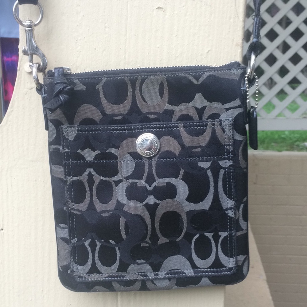 Coach cloth purse with cool design